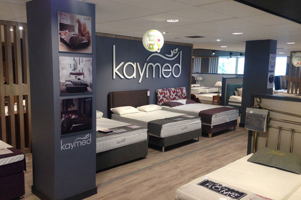Kaymed branded area within store.