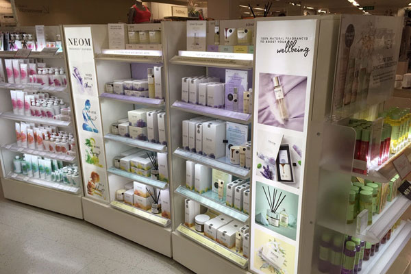 Illuminated shelf units within M&S.